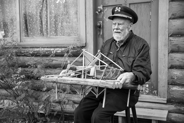Over the years, Jim Robb himself has become one of the territory&#039;s enduring characters. And he&#039;s befriended many others. Here is Captain Dick Stevenson, the man behind Dawson City&#039;s infamous Sourtoe Cocktail, holding a replica fish wheel he built many yea