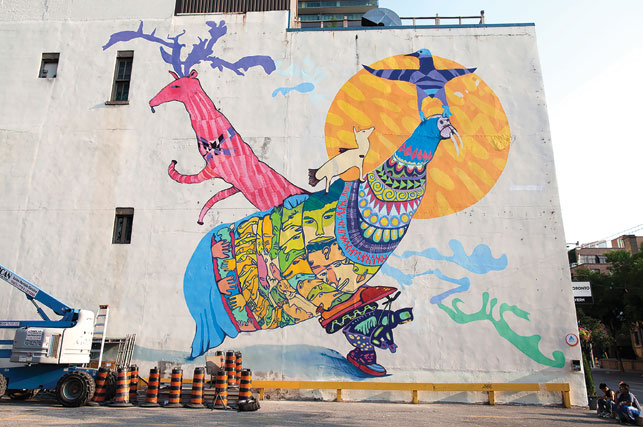 Piliriqatigiingniq (Working together towards a common goal), Toronto, 2015. An Embassy of Imagination project with partners Nunavut Arts and Crafts Association and Mural Routes. Photo by Tobin Grimshaw