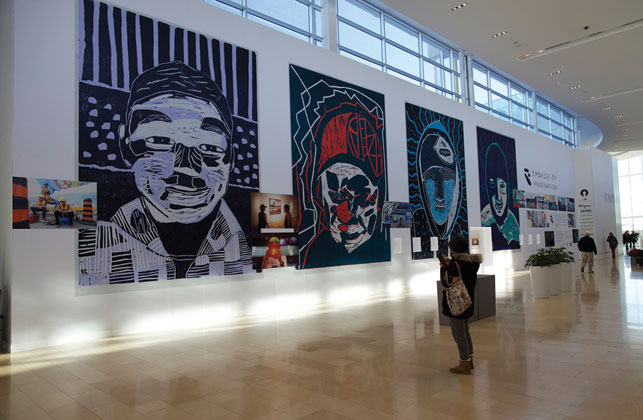  From left, Embassy  of Imagination  paintings brighten up the Square One Mall in Mississauga, Ont.