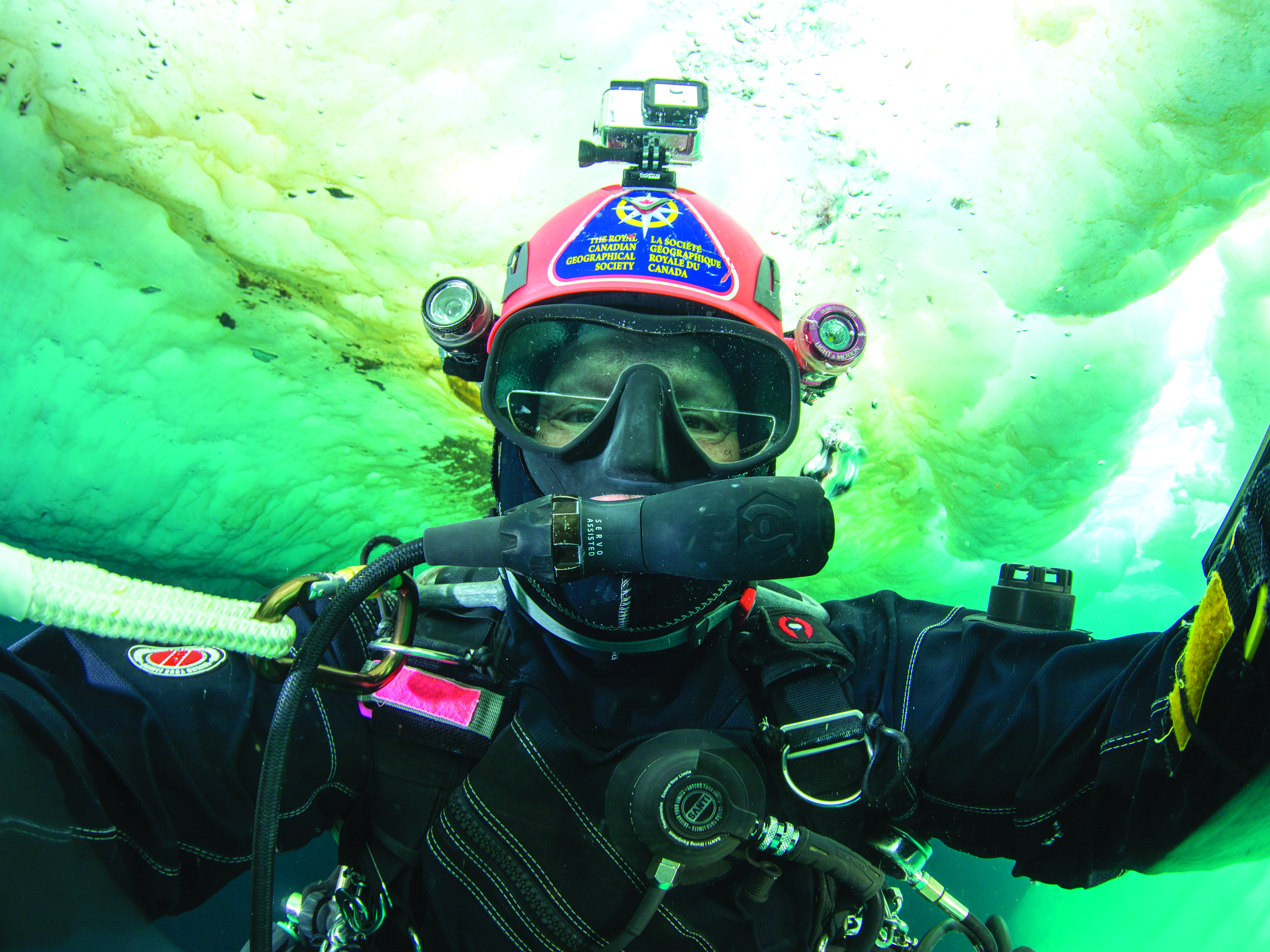 Jill Heinerth takes a selfie while diving beneath the floe edge ice. 