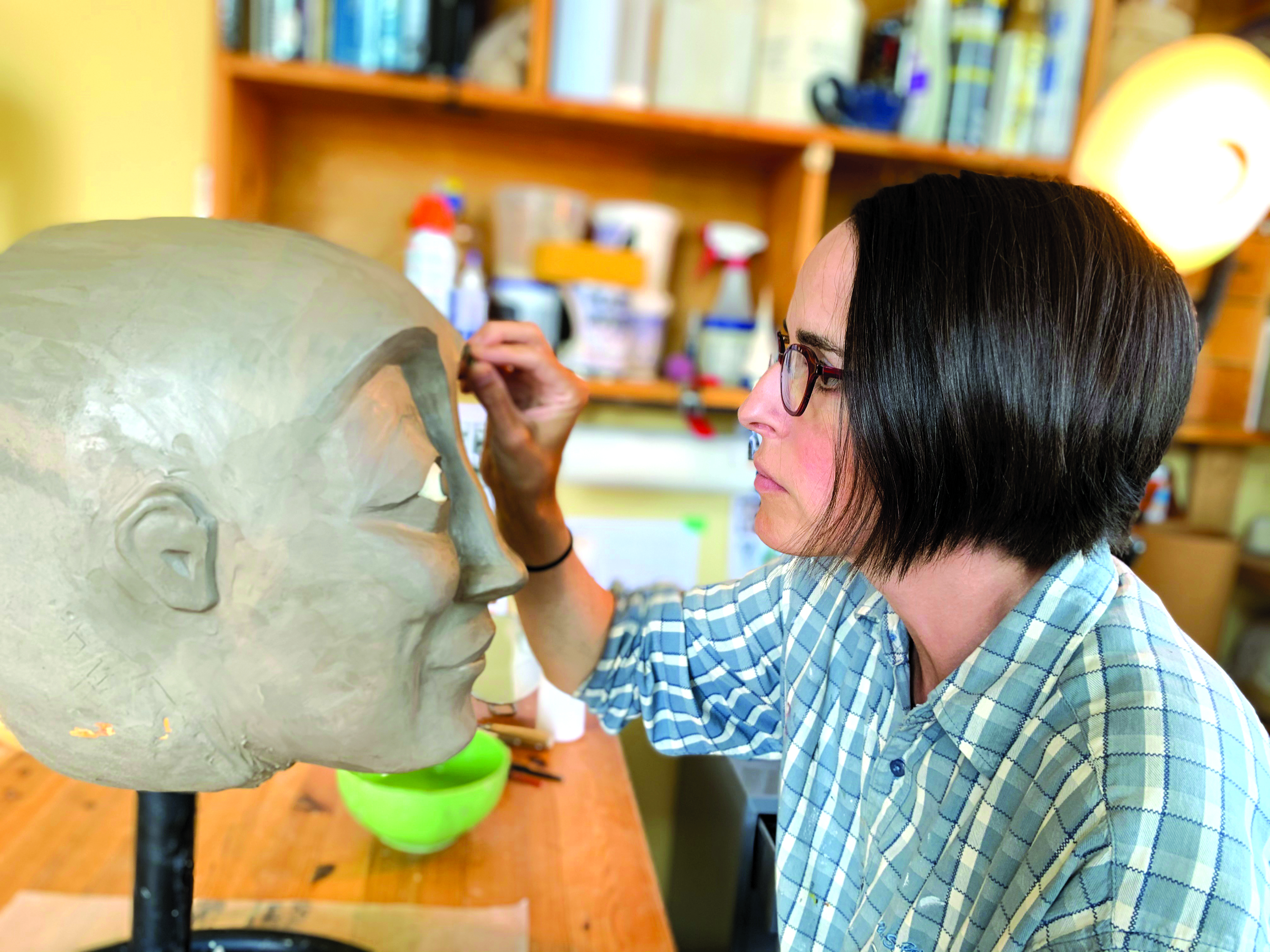 Kate Braidwood makes masks for "Radio Silence."