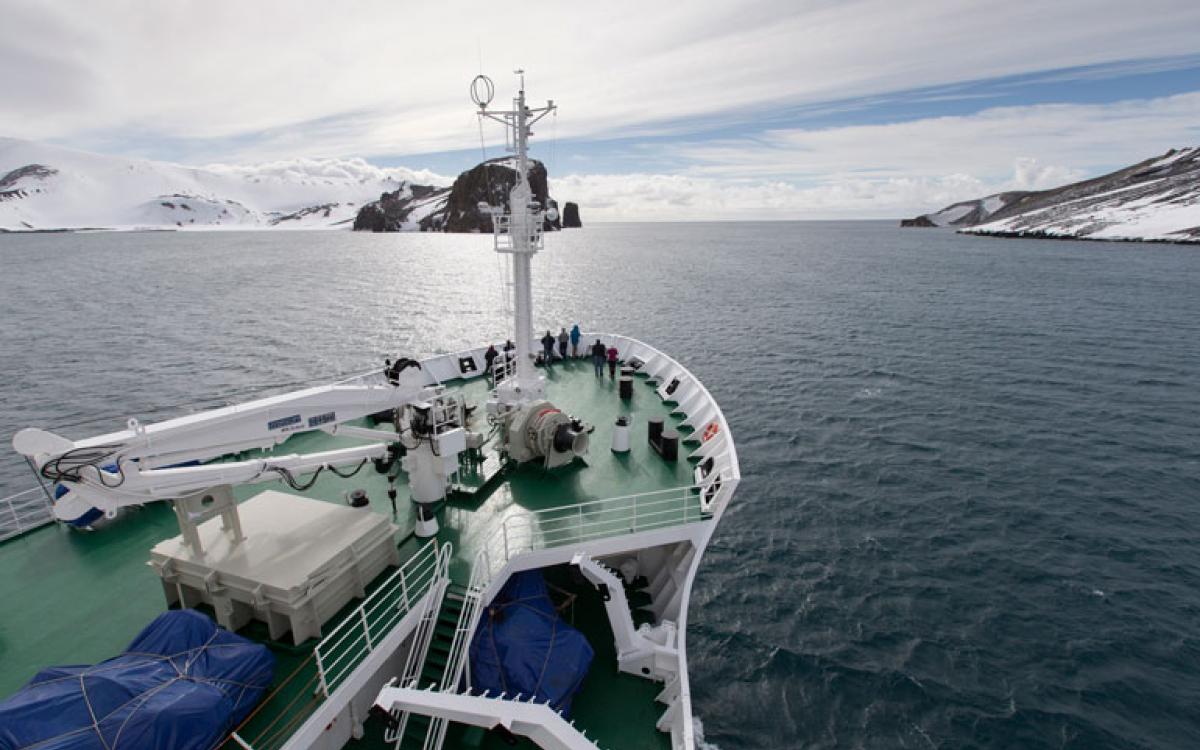 What's in the job description? Spend hours on the open deck, waiting for the wildlife to show up. Courtesy Mark Cowardine/One Ocean