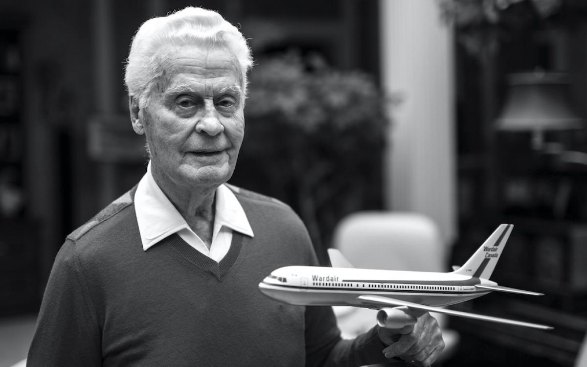Max Ward with a model of one of his Wardair planes.
