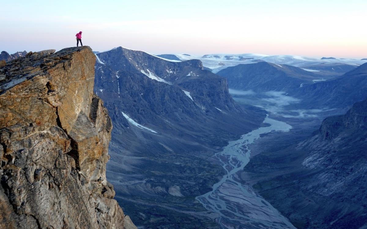 Standing on top of a cliff
