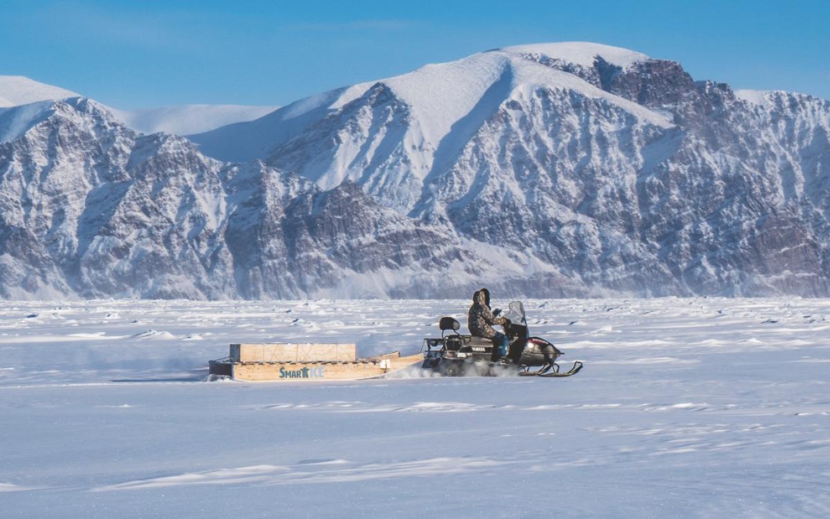 SmartICE team pulling a sensor across the ice