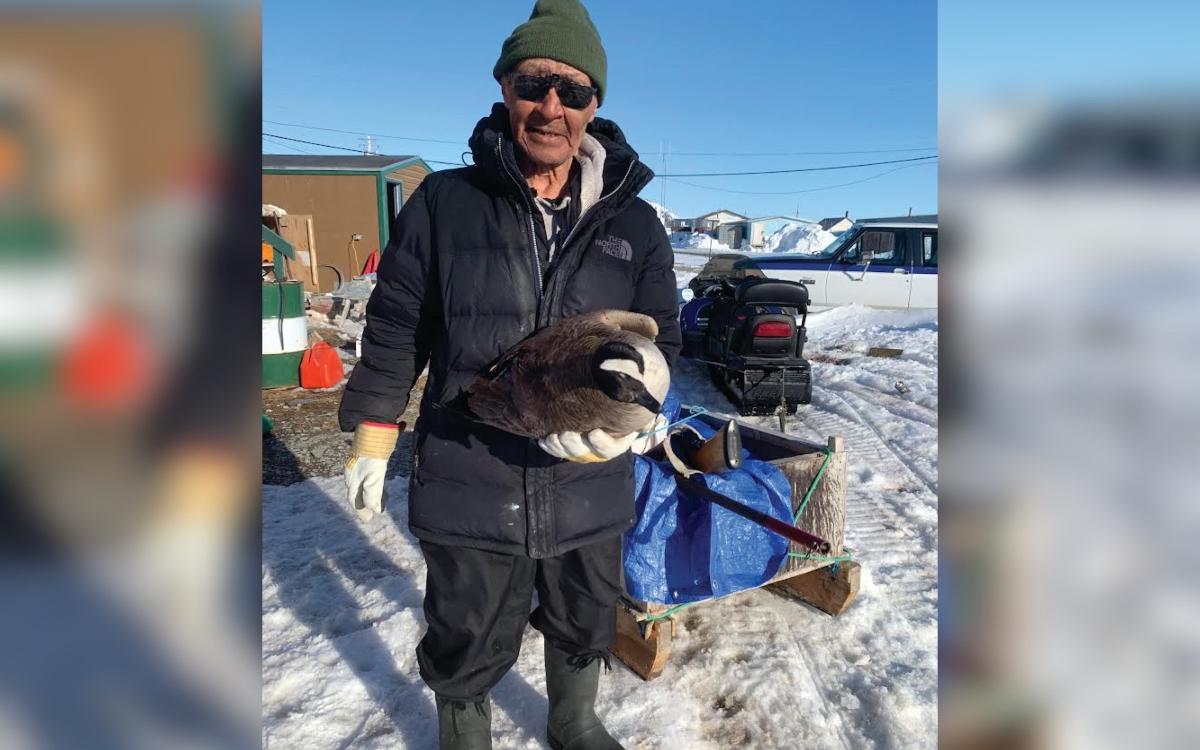 Joe Kitekudlak shows off a goose.