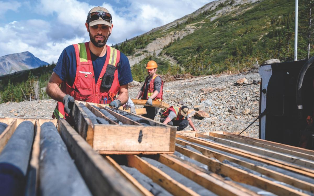 Mine worker checking our core samples.