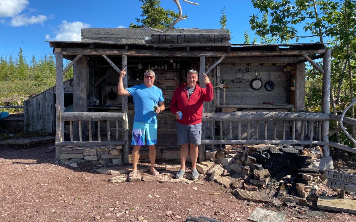 Wally Lemay and Frank Dwyer in front of Etthen Café on Great Slave Lake