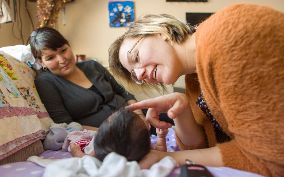Metis midwife Heather Heinrich makes a home visit.