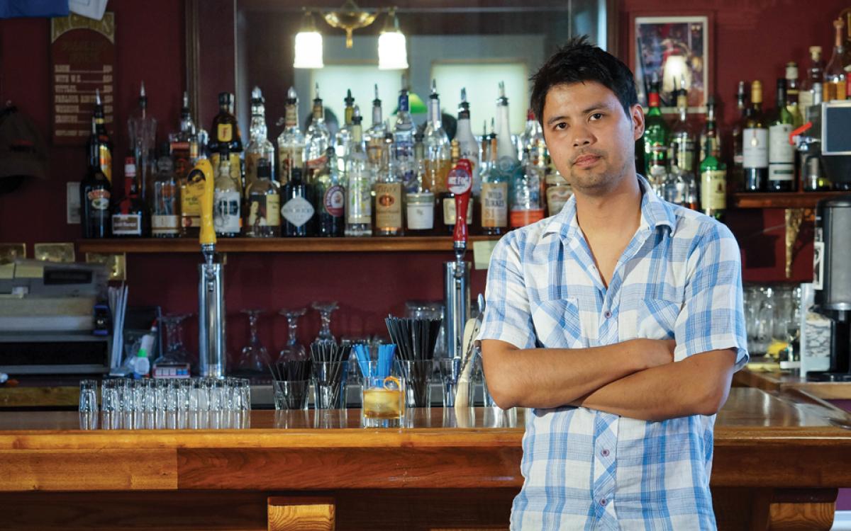 Ryan Matthew pours the drinks. Next time you see him, you might be seeing double. Photo by Chris Healy