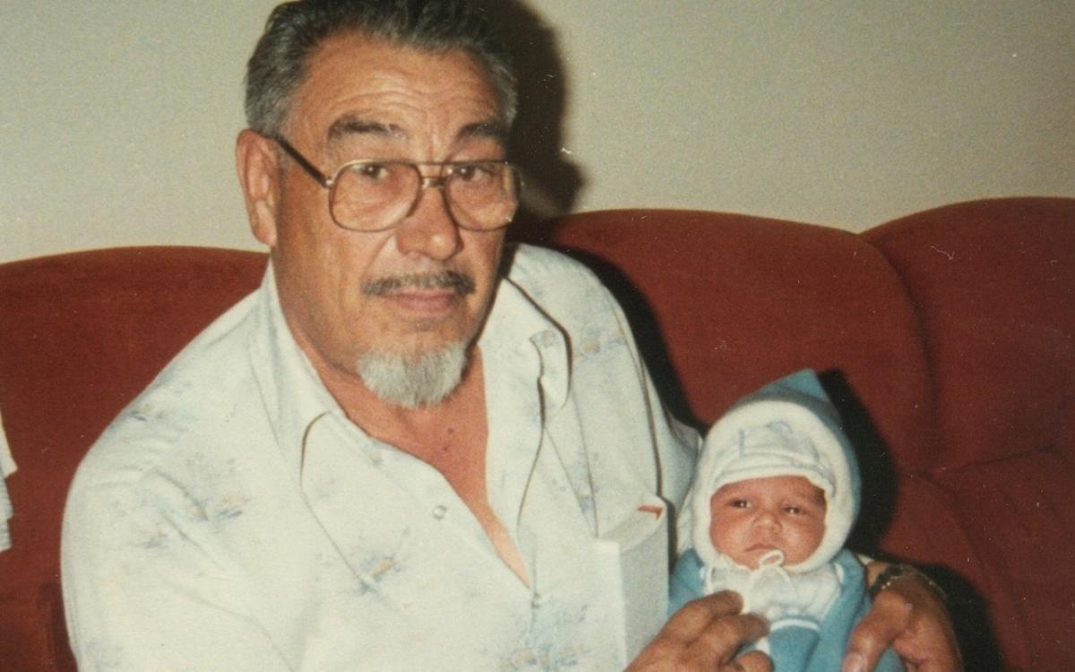 Peter Fraser holding his grandson, Cullen Crozier