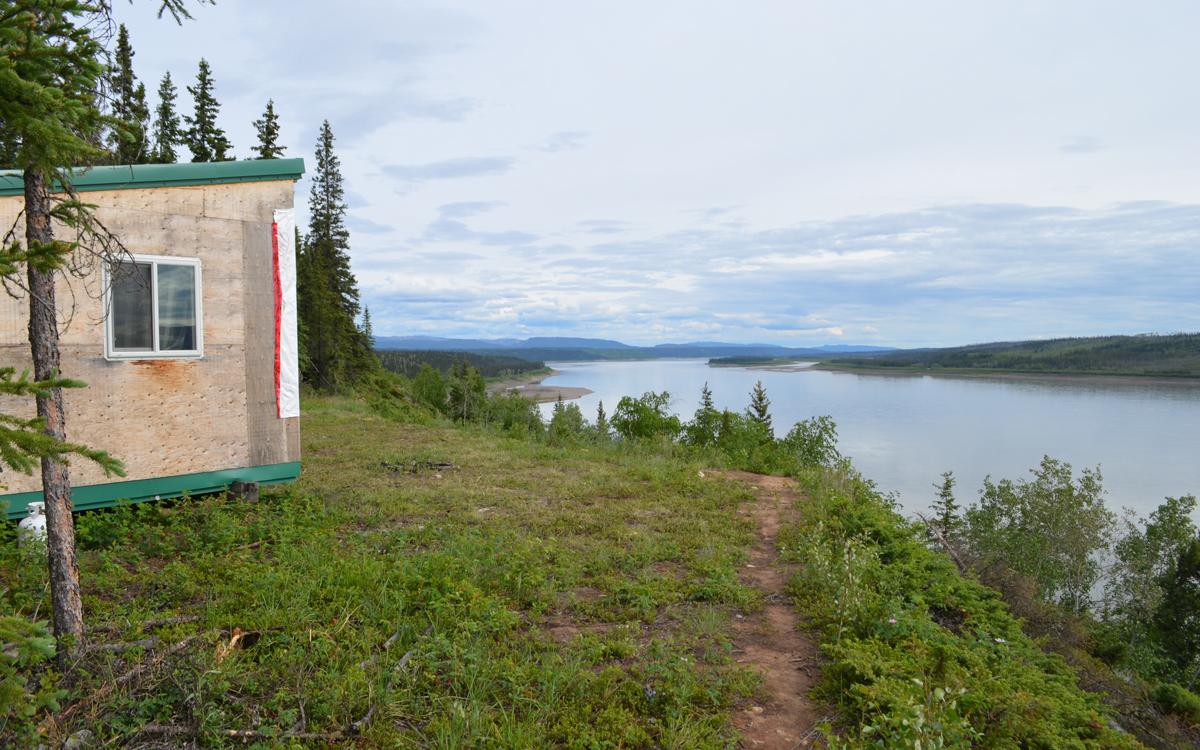 The Pellissey homestead is perched above the wide Mackenzie River. Photo by Daniel Campbell/Up Here