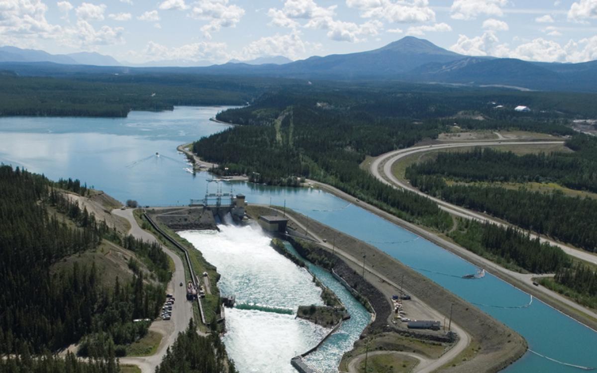 The Whitehorse Dam. Its construction drowned the capital's namesake White Horse Rapids, which now lie beneath Lake Schwatka. Photo courtesy Archbould Photography/Yukon Energy