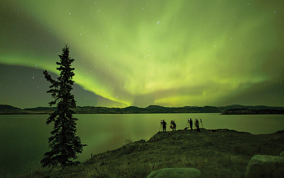  A photo op at Pine Lake, a 20-minute drive north of the log cabin - Black Bear Wilderness Lodge. Photo by Linda Harrison