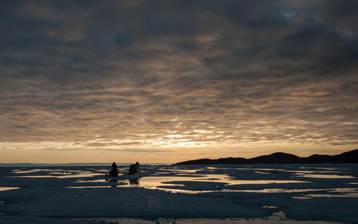 A family heads south on Admiralty Inlet at 1 a.m. Photo by Clare Kines
