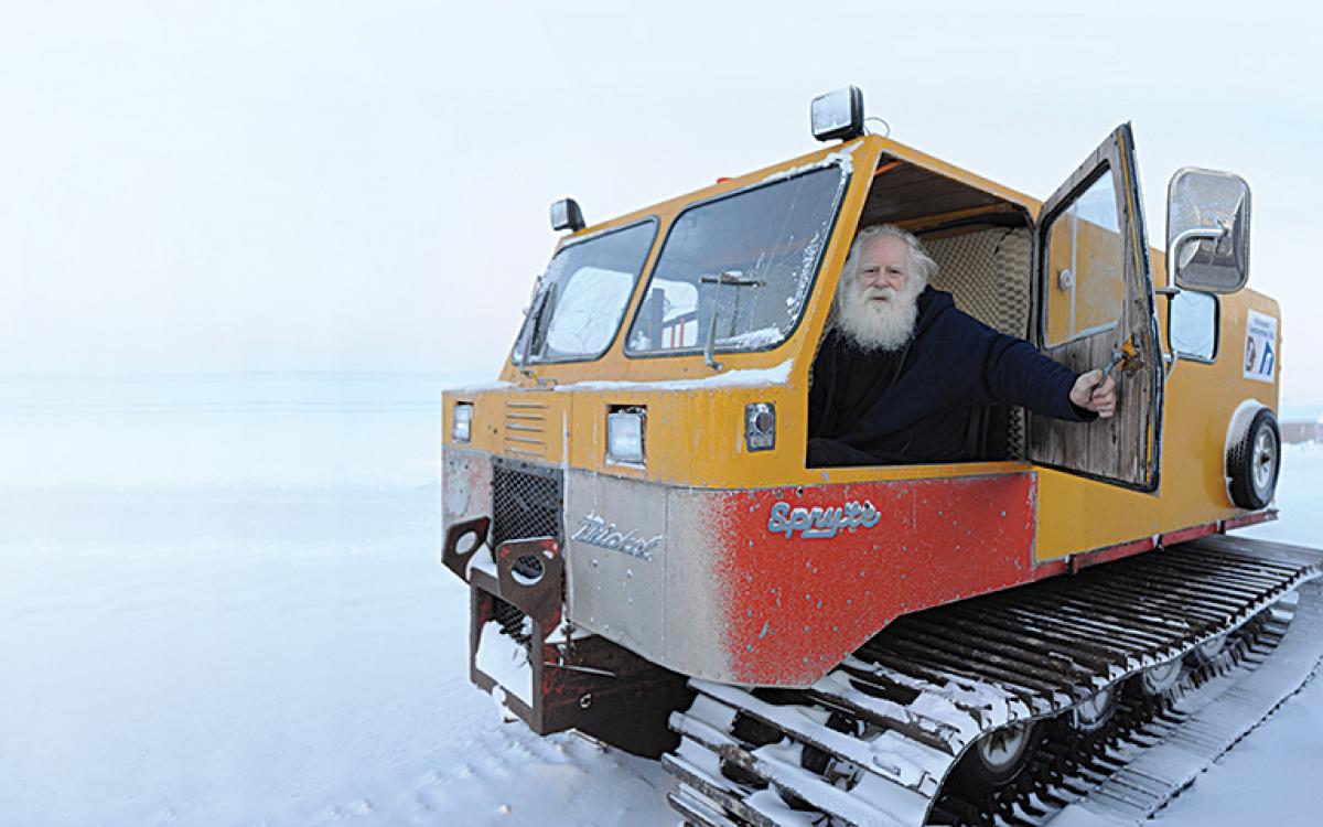 Garry Beattie warms up his Thiokol Spryte Snowcat one chilly morning. He takes it everywhere and anywhere around Cambridge Bay. Photo by Herb Mathisen