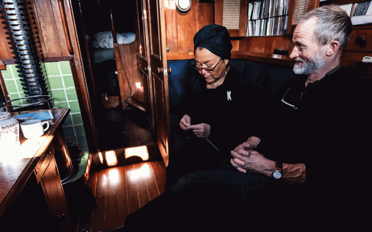 Dorthe and Jens Kjeldsen hunker down in Resolute, Nunavut as they wait for the ice to move. Photo by Mark Kelly