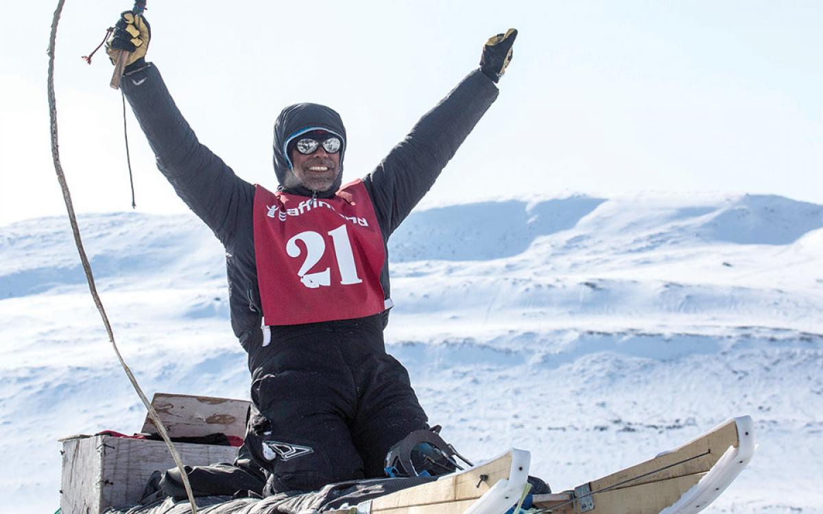 Quest's Best: You can help hoist the winner of the Nunavut Quest into the air in Pond Inlet in late-April. Photo by Clare Kines.