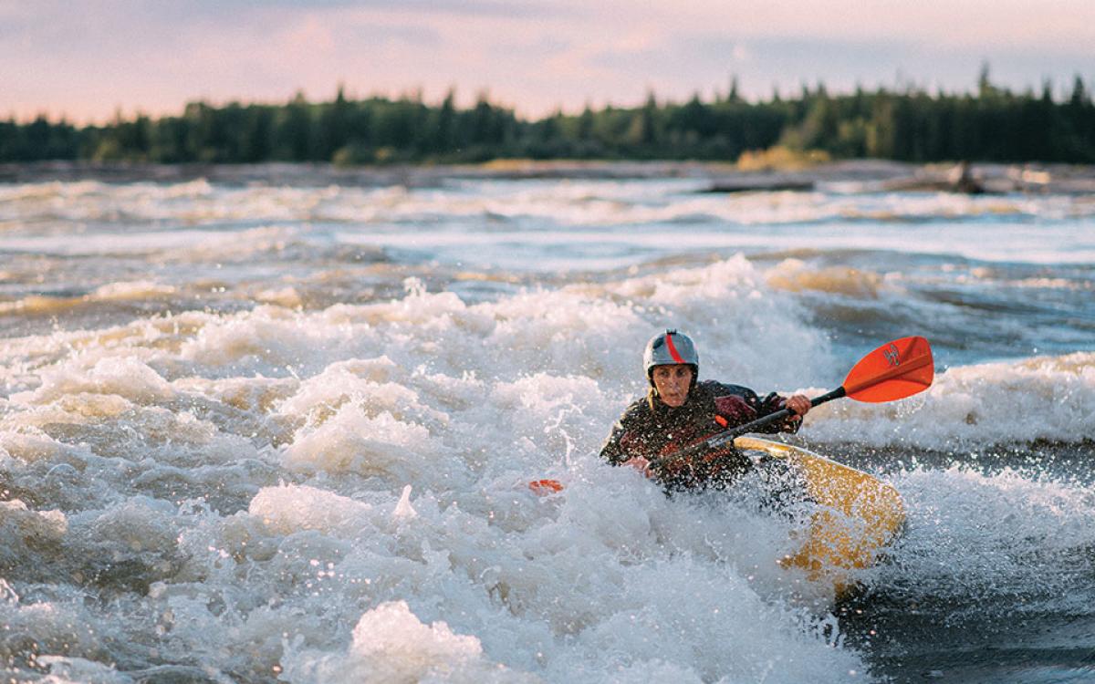 Dip In: Kayakers converge in Fort Smith every August long weekend for Paddlefest. Photo by Darren Roberts/ NWTAT.