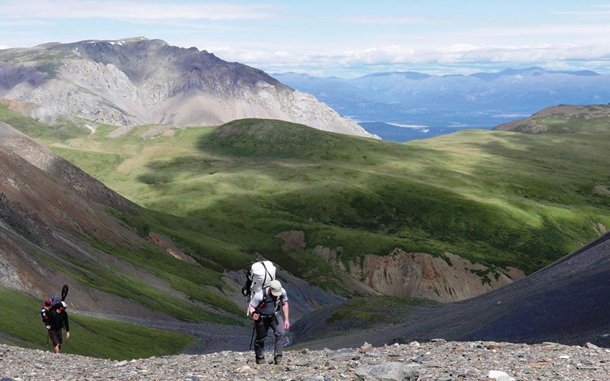 HIKING A PASS BETWEEN THE KLUANE’S DUKE AND DONJEK RIVERS. Photo courtesy of Paul Burbidge.