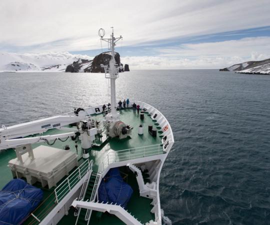 What's in the job description? Spend hours on the open deck, waiting for the wildlife to show up. Courtesy Mark Cowardine/One Ocean