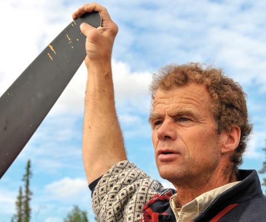 Bush pilot Dave Olesen at his remote Hoarfrost River home. Photo: Kristen Gilbertson Olesen