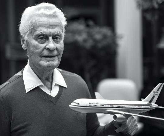Max Ward with a model of one of his Wardair planes.