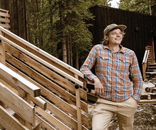 Laird Herbert in front of Black Spruce Hotel