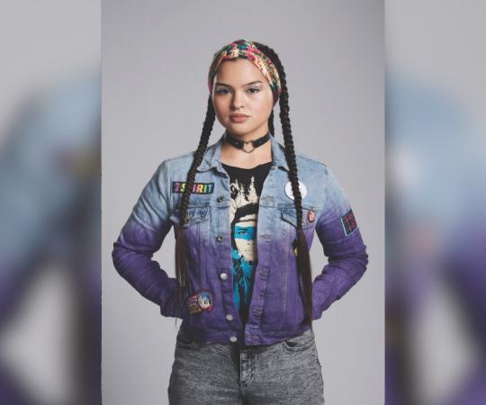 Anna Lambe dressed for her role as Sarah in Trickster