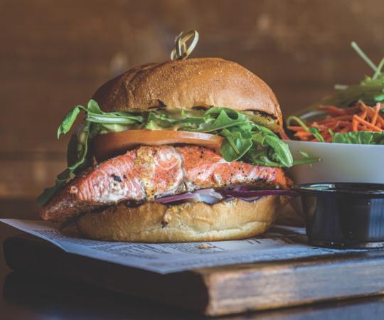  succulent Wild Alaskan Salmon burger from The Dirty Northern Public House, in downtown Whitehorse.