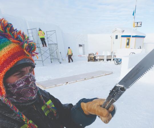 Building Yellowknife's Snowking Castle each year takes weeks of carving.