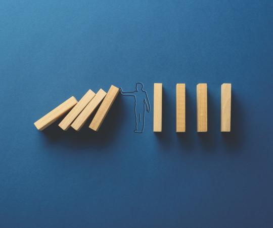 Figure stopping blocks from falling