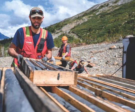 Mine worker checking our core samples.
