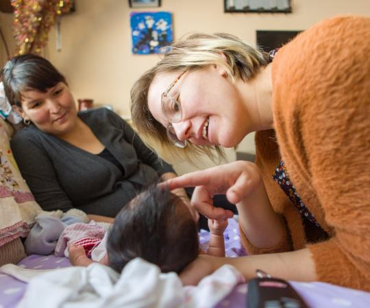 Metis midwife Heather Heinrich makes a home visit.