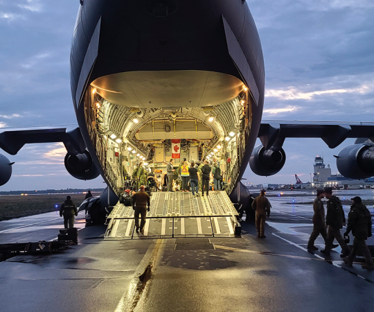 Evacuees Boarding a Flight