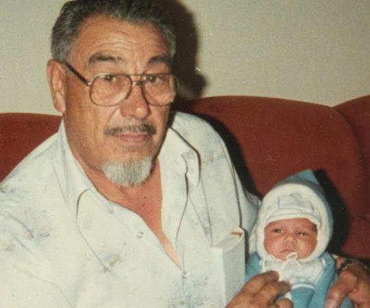 Peter Fraser holding his grandson, Cullen Crozier