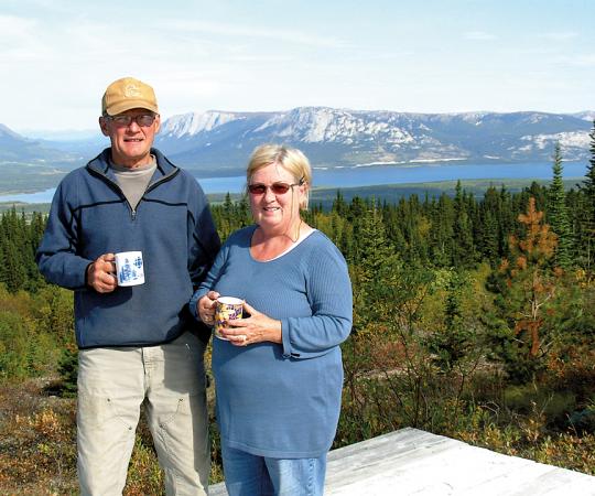 Jim Fowler with his wife Jacquelin in 2009, with the Yukon's Tagish Lake in the background. Photo courtesy of Gord Yakimow