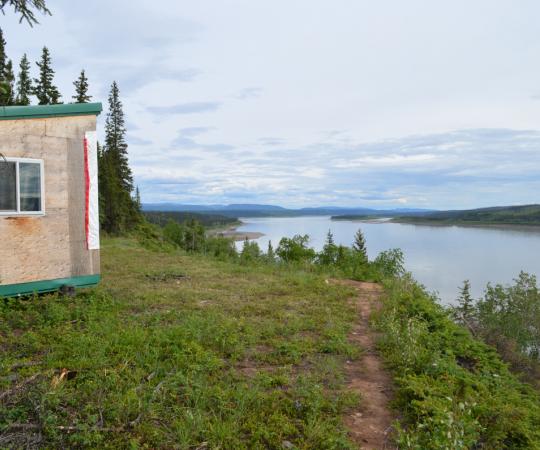 The Pellissey homestead is perched above the wide Mackenzie River. Photo by Daniel Campbell/Up Here