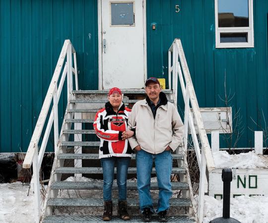 Lorraine Raymond and James Harry on the steps of the John Wayne Kiktorak Centre. “Once we’re out of here, I’m going to work my ass off to keep us out of here,” says Harry. “Right now, a priority is finding a place to stay. And getting a ring for her.”