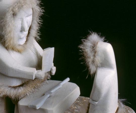 This carving, of Judge J.H. Sissons’ first trial in the NWT, depicts an early interaction between Canada’s legal system and the Inuit. An Inuk, Kaotok, stands before Sissons to answer a charge that he murdered his father on the sea ice. Part of the Sissons/Morrow Collection. © Supreme Court of the Northwest Territories