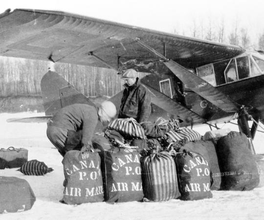 Airmail went a long way in proving that airplanes were a quick and dependable means of delivering goods. NWT Archives/Archibald Fleming Fonds/N-1979-050: 0281