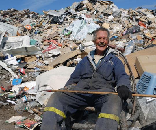 Long-time resident-picker Al Shearing finds a seat and takes a break from rummaging at the Yellowknife dump. All photos courtesy Amy C. Elliott