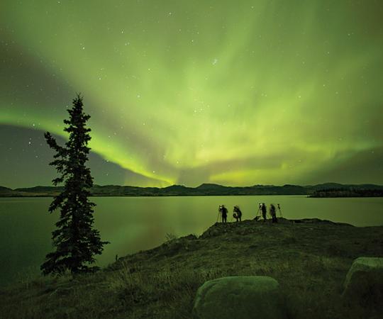  A photo op at Pine Lake, a 20-minute drive north of the log cabin - Black Bear Wilderness Lodge. Photo by Linda Harrison