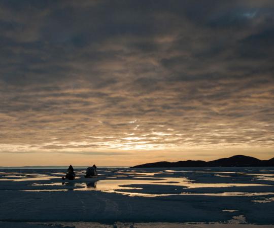 A family heads south on Admiralty Inlet at 1 a.m. Photo by Clare Kines