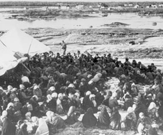 Crowds assemble on Treaty Day in Fort Rae, NWT, in the 1930s. Photo courtesy of Glenbow Museum NA-3844-58