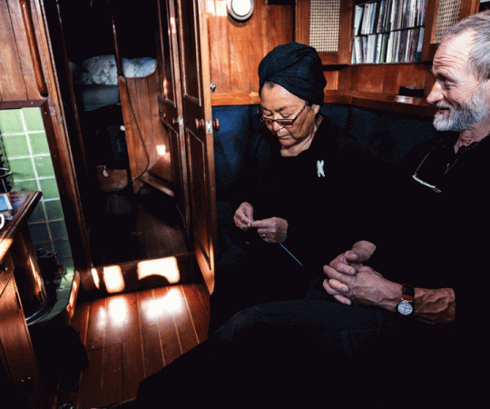 Dorthe and Jens Kjeldsen hunker down in Resolute, Nunavut as they wait for the ice to move. Photo by Mark Kelly