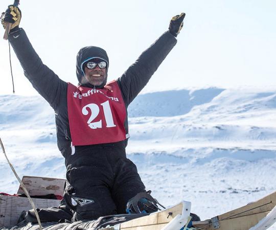 Quest's Best: You can help hoist the winner of the Nunavut Quest into the air in Pond Inlet in late-April. Photo by Clare Kines.