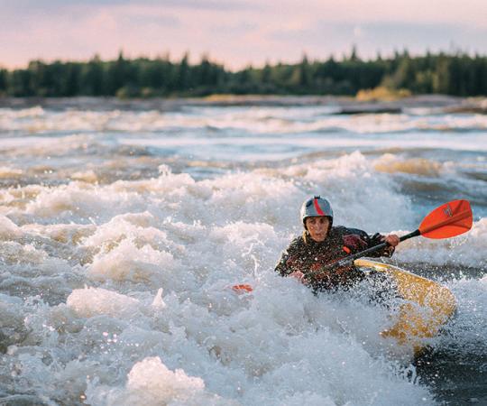 Dip In: Kayakers converge in Fort Smith every August long weekend for Paddlefest. Photo by Darren Roberts/ NWTAT.