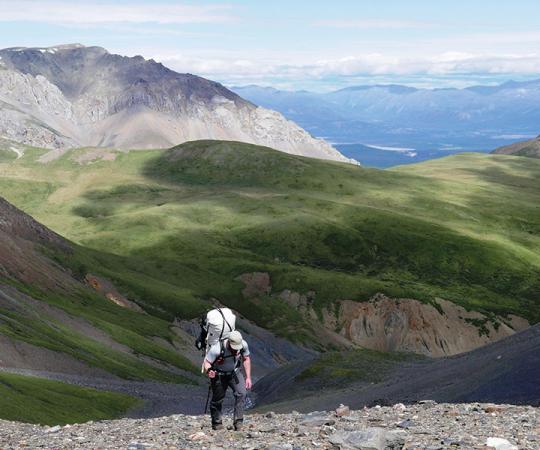 HIKING A PASS BETWEEN THE KLUANE’S DUKE AND DONJEK RIVERS. Photo courtesy of Paul Burbidge.