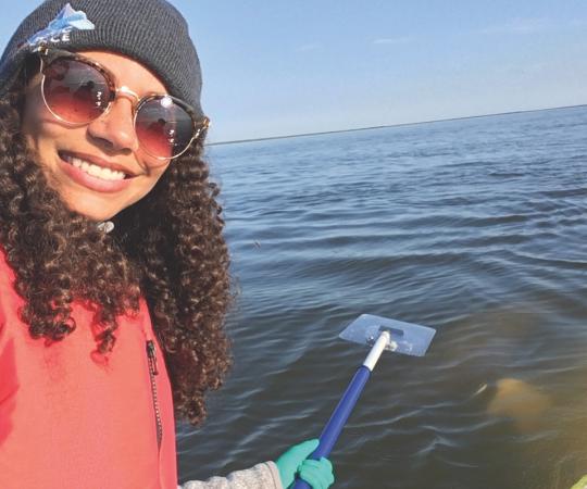Justine Hudson waits for some whale snot samples. 